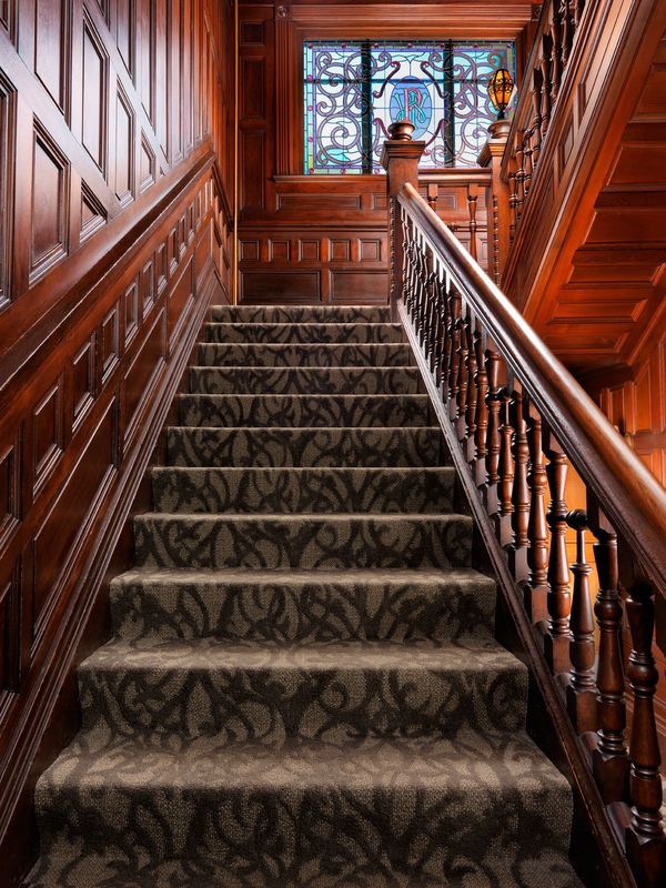A View of the Stairs Leading Up Our Victorian Era Hotel